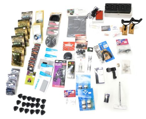 A quantity of Stagg Kinsman and other guitar accessories, to include a cable clamp, a latching foot switch, Wedgie guitar pic
