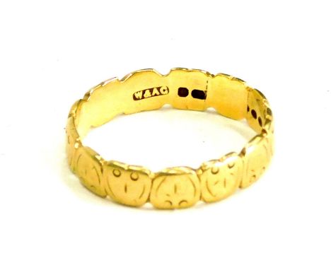 A dress ring, formed of owl faces, and joined yellow metal with rubbed and partial hallmarks, possibly 18ct, ring size Q½, 3.