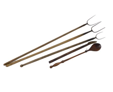 A group of vintage agricultural tools, comprising two hay forks, a hardwood spoon, and a type knife. (5)