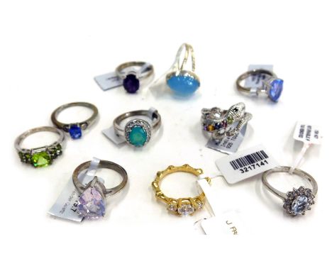 A collection of silver and other dress rings, comprising nine silver dress rings, each stone set, and a silver gilt and stone