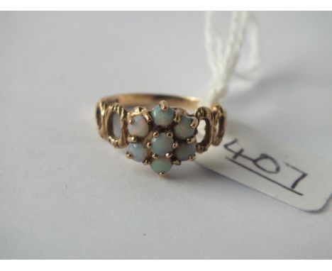 An opal cluster ring in 9ct - size J - 3gms