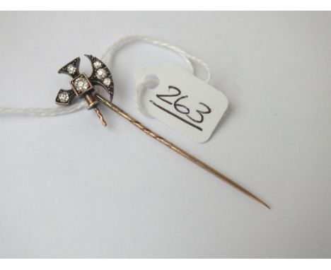 A 19th century diamond set stick pin in the form of an axe set in gold