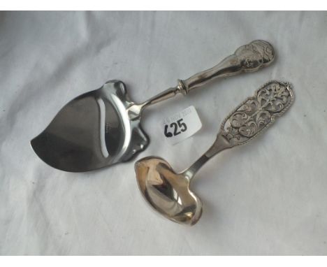 A decorative Dutch sauce ladle (830 standard) and a cheese grater