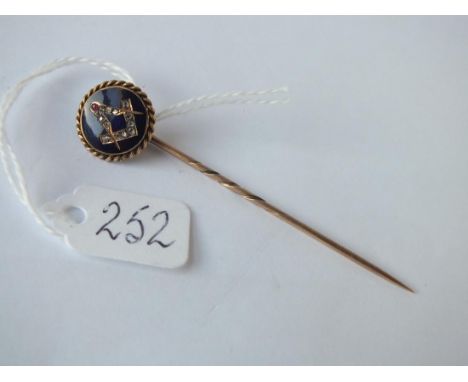 An antique masonic circulare gold stick pin enamelled, set with rose diamons &amp; a ruby - 3.9gms