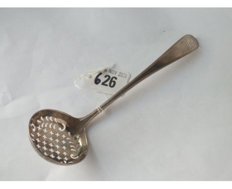 A George III crested sifter ladle with beaded edge - London 1786 by script JW