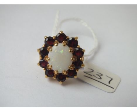 A large opal &amp; garnet cluster ring in 9ct - size M - 7.8gms