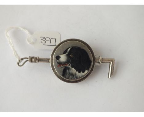 An enamel dogs head &amp; riding crop brooch with initials AA set in silver (unmarked)