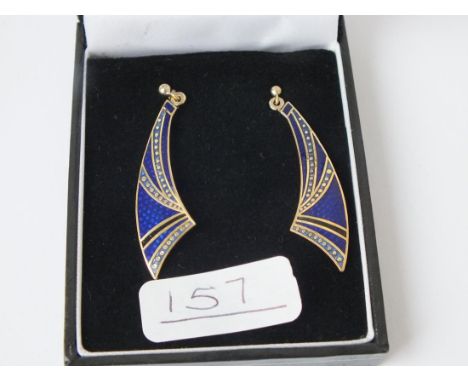 A pair of blue enamel earrings in 9ct 