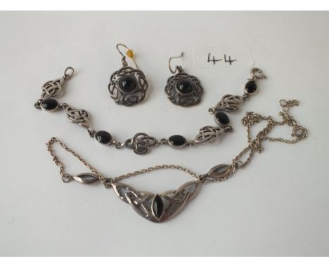 A Celtic style silver necklace with earrings etc.