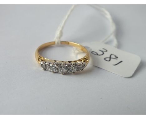 A 5 stone diamond ring set in 18ct gold - size K - 1.9gms