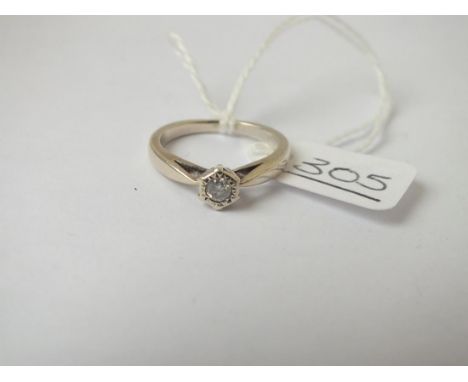 A white gold single stone diamond ring in 9ct - size k 