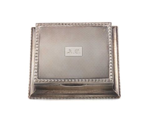 GEORGE VI SILVER CIGARETTE BOX,maker Henry Perkins &amp; Sons, London 1928, of oblong form, with engine turned exterior, foli