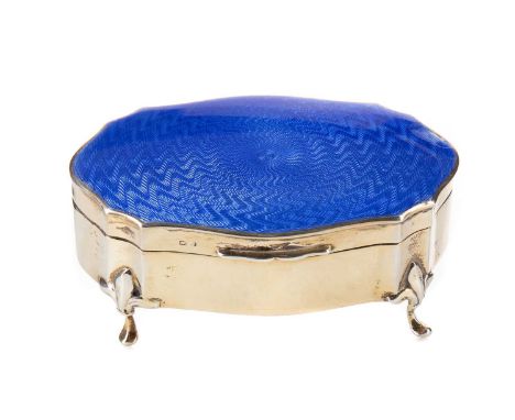 GEORGE VI SILVER GILT AND GUILLOCHE ENAMEL CASKET,maker Henry Matthews, Birmingham 1945, of shaped outline, the hinged cover 
