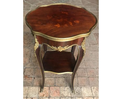 Mahogany inlaid occasional table with decorative brass fittings, cabriole legs with shelf under. 72 x 41 x 36cm w.Condition R