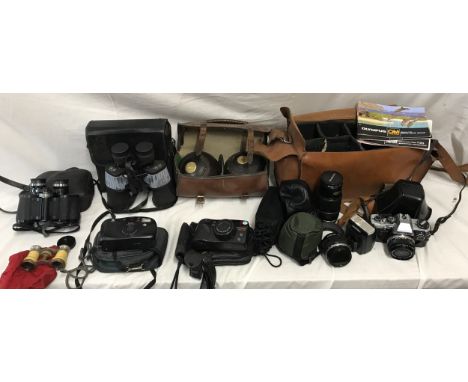 A collection to  include Olympus OM10 with lenses and accessories, Olympus Superzoom 110, Minolta Riva, Sunagor 10x40 with ca