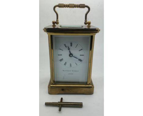 A 20thC Matthew Norman brass cased carriage clock. 15cm h.Condition ReportGood condition with key.
