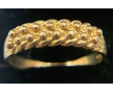 A 9 carat gold dress ring, size W. 4 gm.Condition ReportSome wear to band.