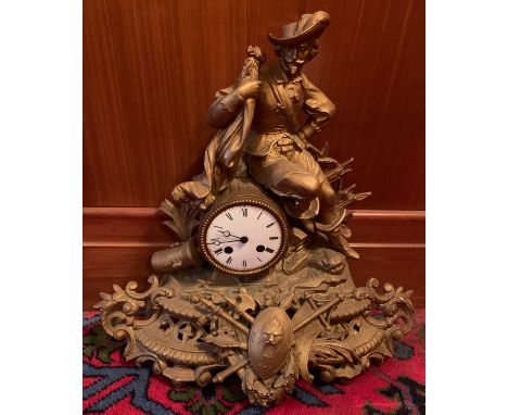 A Victorian gilt metal mantle clock with seated gentleman to top. 42cm h.Condition ReportGood condition.