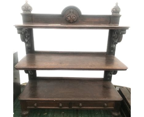 An oak three height graduating shelf buffet with 2 drawers to the base. 120 w x 49 d x 135cm h.Condition ReportWater mark sta
