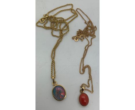 Two 9ct gold chains with pendant drops, one opal the other coral. 5.5gm total. Length 45cm.Condition ReportGood condition.