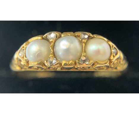 A 19thC Pearl and diamond set ring, Size O, weight 3.3gm.Condition ReportMarks rubbed, otherwise good condition.