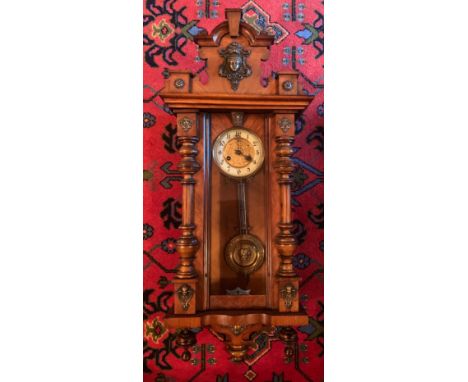 A Victorian walnut chiming wall clock with gilt and enamel dial. 100cm.Condition ReportGood condition.