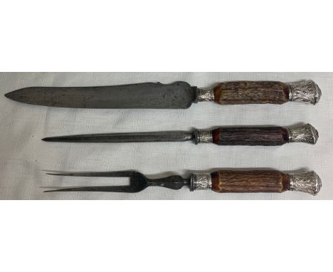 A Victorian  three piece bone carving set with silver mounts. Blade marked Lee and Wigfull. Sheffield 1884.Condition ReportFo