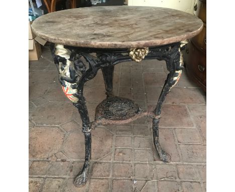 Circular cast iron pub table, Britannia and Lion heads base, N.E.B Ltd, Sunderland, mahogany top 65 w x 74cm w.Condition Repo