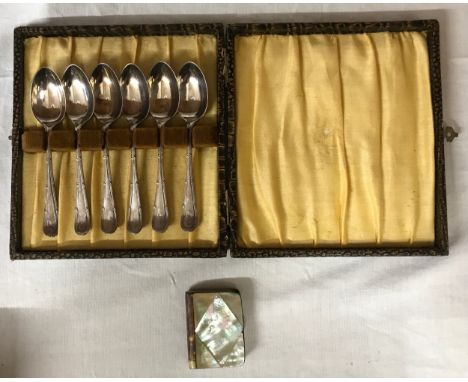 Six boxed silver spoons, Sheffield 1922, 72gm together with a white metal mother of pearl and tortoiseshell vesta case. 4.5cm