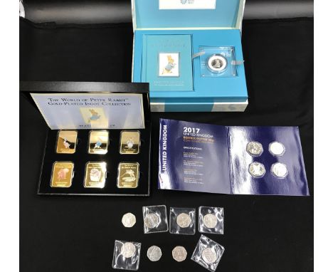 A collection of Beatrix Potter coinage to include Royal Mint The Tale of Peter Rabbit Ltd Edition coin and book in a gift box