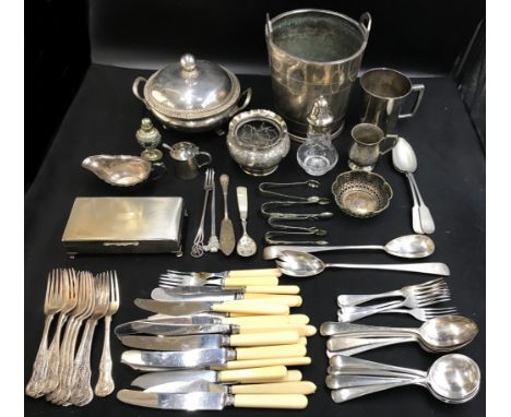A quantity of silver plate to include ice bucket, lidded dish, pepperette, sugar tongs, knives and fork, teaspoons, small qua
