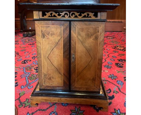 The Britannia polyphon with 9 discs. Ebonised and veneered. 55 h x 43cm w.