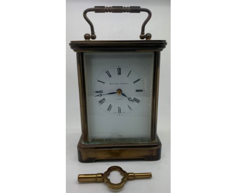 A brass carriage clock by Matthew Norman . 18cm h.Condition ReportNot working.