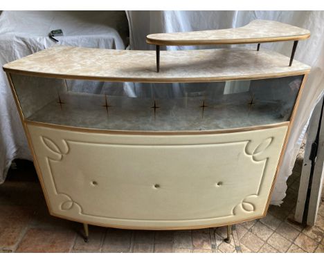 A mid century formica topped bow front bar with top shelf and back draw. 114 w x 107 h x 46cm d approx.Condition ReportFairly