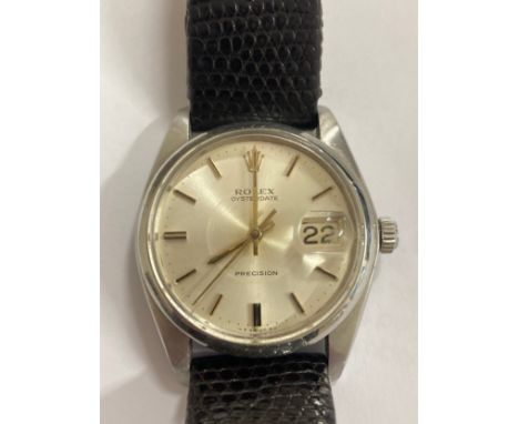 A gents Rolex Oysterdate Precision manual wind stainless steel wristwatch, model 6694 case number 5741396, 36mm case on a pla