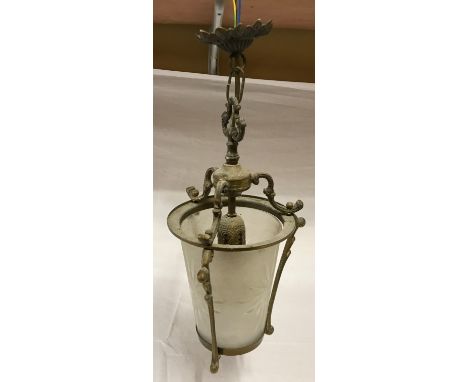 Brass hanging wall lantern with a cut glass shade. Approx 43cm, width 22cm.Condition ReportGood condition, dusty.