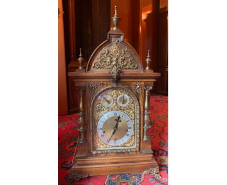 A superb walnut chiming bracket clock with ormolu mounts. 77 h x 39cm w.