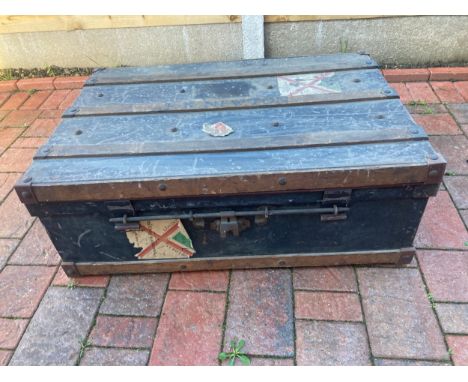 A vintage metal and wood travelling trunk. 90 x 62 x 33cm h.