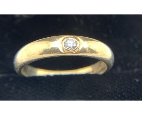A 9 carat gold gypsy ring set with single diamond. 2.5gm. Size N.Condition ReportGood condition.