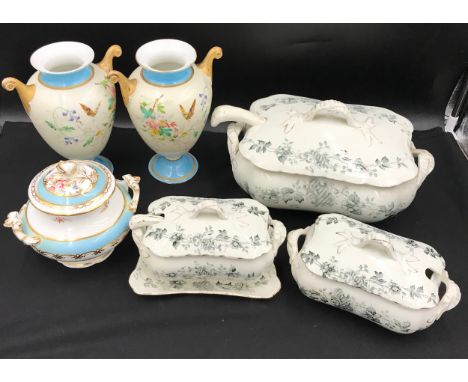 Three tureens with floral pattern, largest 30cms long x 19cms wide x 19cms deep with ladle, two smaller tureens 21cms long x 