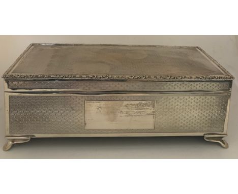 A silver engine turned cigarette box , vacant cartouche to front, Birmingham 1972, maker John Rose. 9 x 20.5 x 7cm h.  756.4g