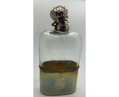 A silver and glass hip flask Birmingham 1905 Mappin &amp; Webb. 16cm h.Condition ReportBash to top and damage to top silver r