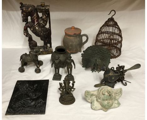 Metal, wooden and ceramic ornaments to include : a carved wooden horse 33cm, lidded tankard with 3 feet, pottery cherub, two 