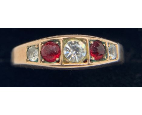 A 9ct gold ring set with red and white stones, size P. Weight 1.7gm.Condition ReportChips to stones and damage to setting.