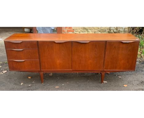 A Mcintosh sideboard, three drawers and two cupboard, one dropdown with slide out shelf. 201 l x 45 d x 75cm h.