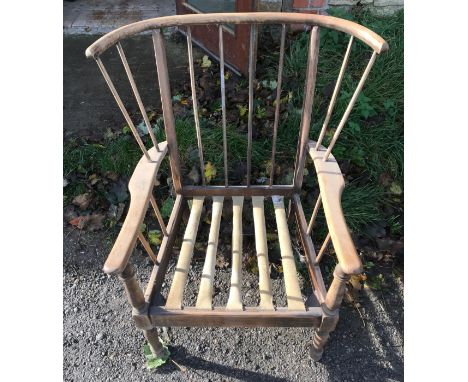 A beech wood framed stick back armchair. No cushion. Ht to seat 37cms, width at back 84cms, ht to back 86cms.Condition Report