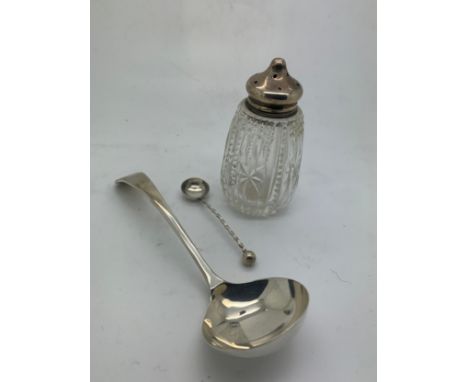 A glass and silver topped pepper pot, a sauce ladle Sheffield 1962 and a salt spoon Birmingham 1890. Weighable silver 37.5gm.