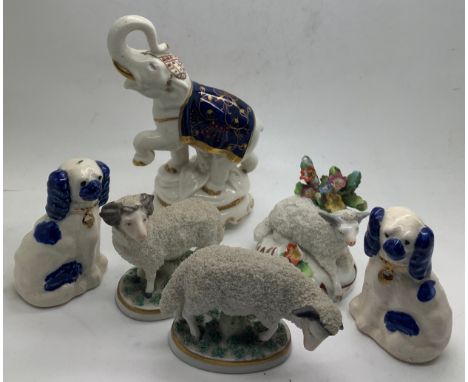 Six various 19thC/ early 20thC ceramic animals to include dogs, sheep and an elephant 14cm h.Condition ReportOne sheep with l