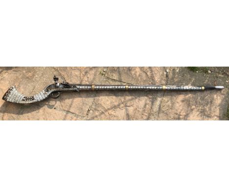 Northwest Frontier Flintlock Musket, 43'' barrel, stock heavily inlaid with brass and mother of pearl, East India Company loc