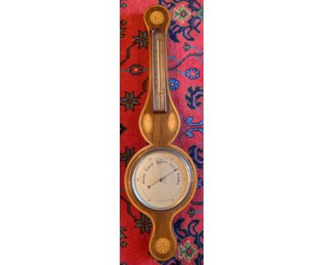 A good quality rosewood and shell inlaid aneroid barometer. 91cm h.Condition ReportGood condition.